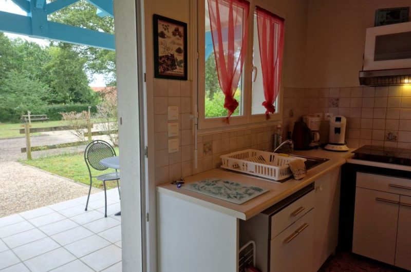 2024 Entrée cuisine avec vue terrasse