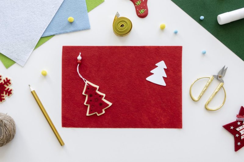top-view-essentials-crafting-christmas-gift-with-string-scissors